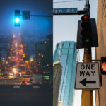 One-way sign and traffic signals at night