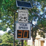 A TC-600 speed radar sign in a neighborhood.
